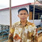 Camat Muara Badak Arpan.